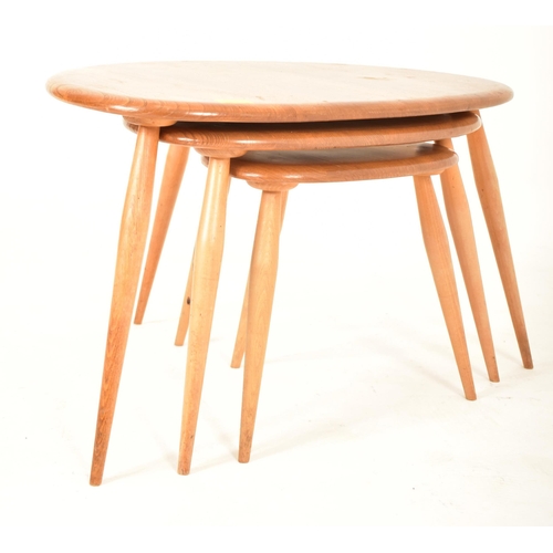 9 - Lucian Ercolani for Ercol - Model 354 - A retro 1960s beech and elm blonde set of Pebble nesting tab... 