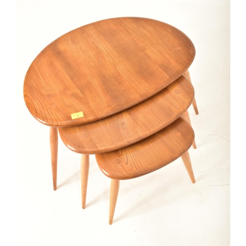 9 - Lucian Ercolani for Ercol - Model 354 - A retro 1960s beech and elm blonde set of Pebble nesting tab... 