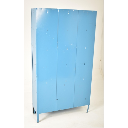 97 - A retro 20th century vintage industrial / school metal locker cabinet of upright form. The cabinet c... 