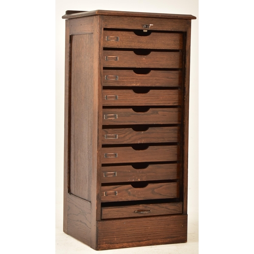 98 - An early 20th century Art Deco oak upright pedestal filing office cabinet chest. The cabinet having ... 