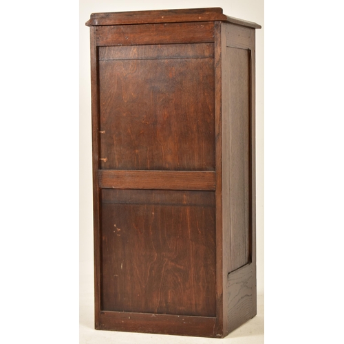 98 - An early 20th century Art Deco oak upright pedestal filing office cabinet chest. The cabinet having ... 