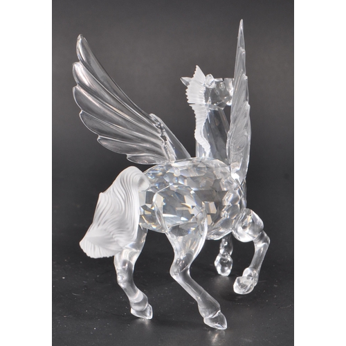 102 - Swarovski - A collection of Swarovski crystal glass decorative animal figures. The collection to inc... 