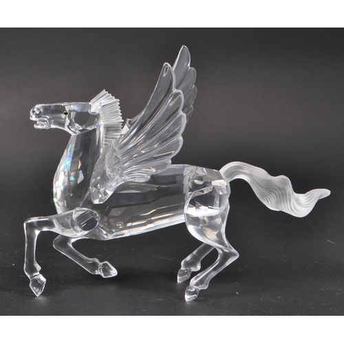 102 - Swarovski - A collection of Swarovski crystal glass decorative animal figures. The collection to inc... 