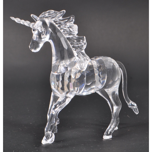 102 - Swarovski - A collection of Swarovski crystal glass decorative animal figures. The collection to inc... 