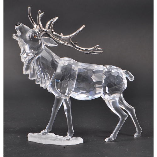 102 - Swarovski - A collection of Swarovski crystal glass decorative animal figures. The collection to inc... 