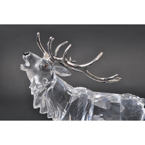 102 - Swarovski - A collection of Swarovski crystal glass decorative animal figures. The collection to inc... 