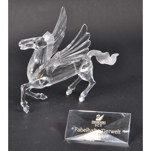 102 - Swarovski - A collection of Swarovski crystal glass decorative animal figures. The collection to inc... 