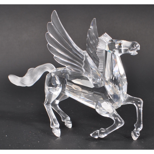 102 - Swarovski - A collection of Swarovski crystal glass decorative animal figures. The collection to inc... 