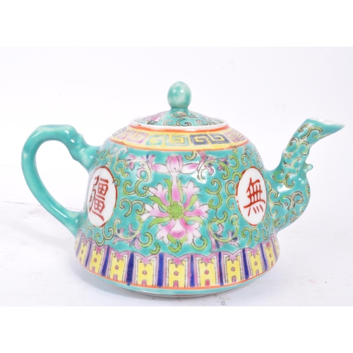 104 - Early 20th Century 1920s vintage porcelain Chinese teapot in blue ground with characters and foliage... 