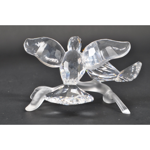 105 - Swarovski - A collection of Swarovski crystal decorative bird figures / ornaments. The collection to... 