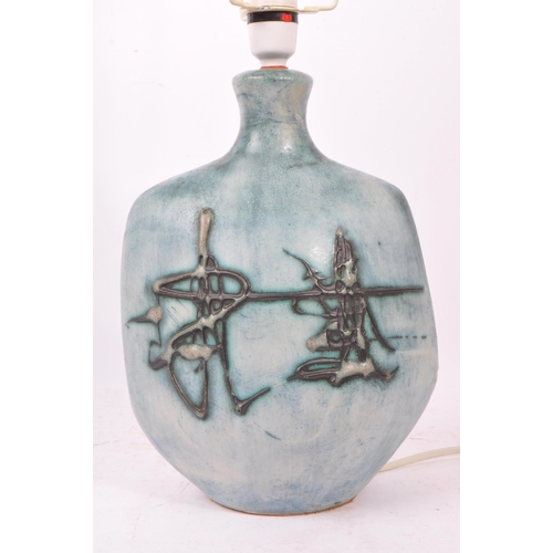 111 - Tremaen Pottery - A 20th Century ceramic Tremaen Cornish pottery lamp in faded blue colour ground wi... 