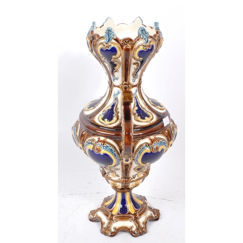 114 - A 19th Century Majolica style porcelain china twin handle German vase in the manner of Wilhelm Schil... 