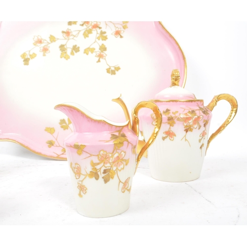 123 - An early 20th Century Edwardian china porcelain bachelor service in white and pink ground with gilt ... 