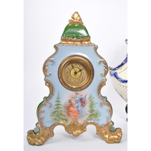 129 - Sitzendorf - A late 19th Century Sitzendorf porcelain mantel clock in pastel pink and blue ground wi... 