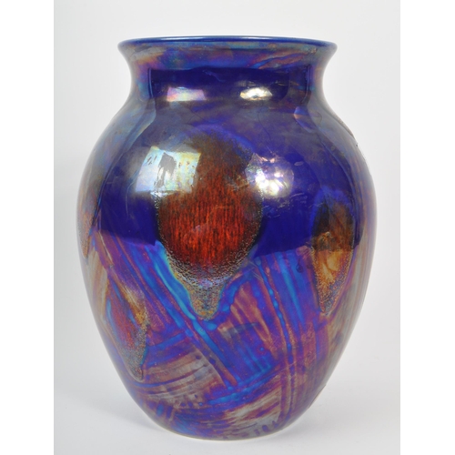 138 - Poole Pottery - A 20th Century glazed ceramic Poole Pottery vase from the 'Volcano' series, in dark ... 