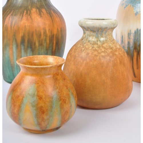 140 - Ruskin - A collection of five early 20th Century 1930s art deco ceramic Ruskin vases various shapes ... 