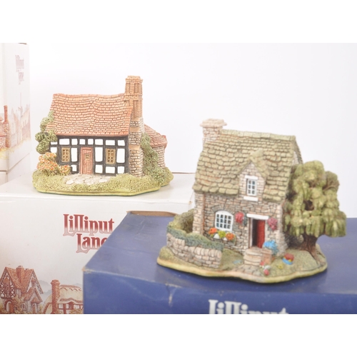 153 - Lilliput Lane - A collection of seven Lilliput Lane cottage figures / ornaments. To include Five Way... 