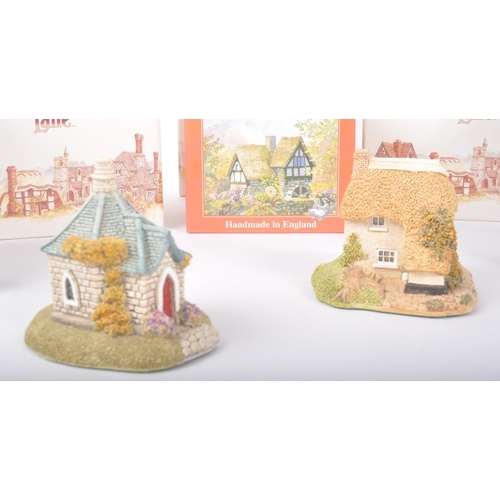 153 - Lilliput Lane - A collection of seven Lilliput Lane cottage figures / ornaments. To include Five Way... 