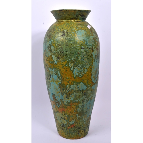 157 - A 19th century ceramic pottery table vase. Of circular form with flared rim into a tapering body. Wi... 