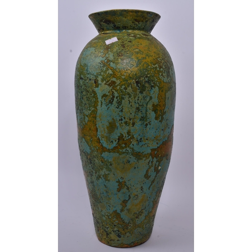 157 - A 19th century ceramic pottery table vase. Of circular form with flared rim into a tapering body. Wi... 