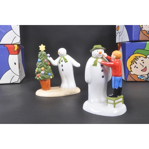 171 - Coalport Characters - The Snowman - A collection of four porcelain china figurines. Comprising of to... 