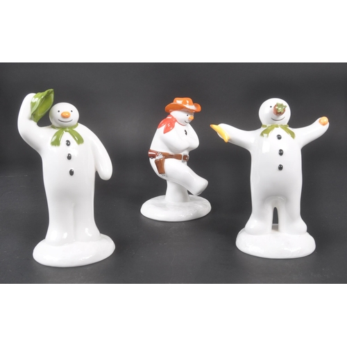 173 - Coalport Characters - The Snowman - A collection of four contemporary porcelain china figurines. To ... 