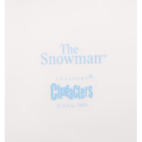 173 - Coalport Characters - The Snowman - A collection of four contemporary porcelain china figurines. To ... 