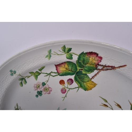 174 - Minton / Wedgwood - A china porcelain oval 1879 dated Minton platter decorated with shrubbery includ... 