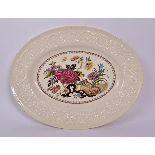 174 - Minton / Wedgwood - A china porcelain oval 1879 dated Minton platter decorated with shrubbery includ... 