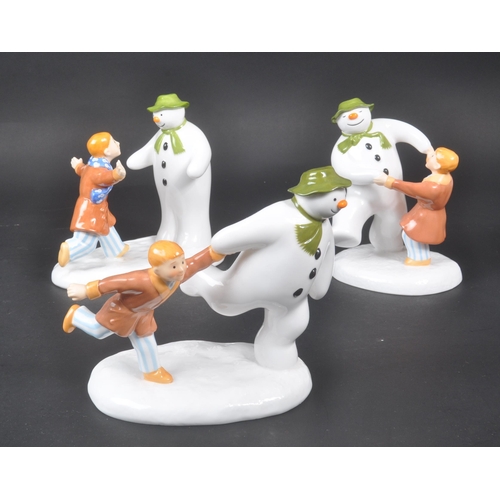 178 - Coalport Characters - The Snowman - A collection of three contemporary porcelain china figurines and... 