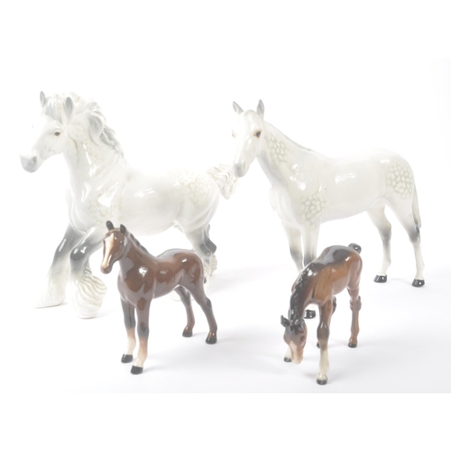 185 - Beswick - A collection of four porcelain china. Comprising grey mare model, two smaller brown foals ... 