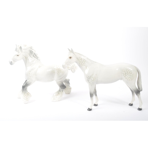 185 - Beswick - A collection of four porcelain china. Comprising grey mare model, two smaller brown foals ... 