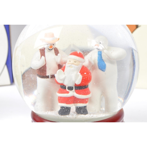 187 - Coalport Characters - The Snowman - Collection of three snow globe. Comprising of hold on tight, lin... 