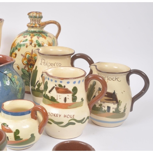 189 - Torquay Pottery / Motto Wares - A collection of ceramic pottery items. To include, large double hand... 