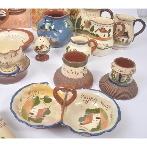 189 - Torquay Pottery / Motto Wares - A collection of ceramic pottery items. To include, large double hand... 