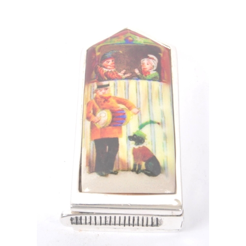 192 - A vintage 20th century silver vesta case .Stamped 800, enamelled front with a Punch & Judy scene. Me... 