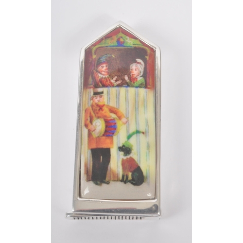 192 - A vintage 20th century silver vesta case .Stamped 800, enamelled front with a Punch & Judy scene. Me... 