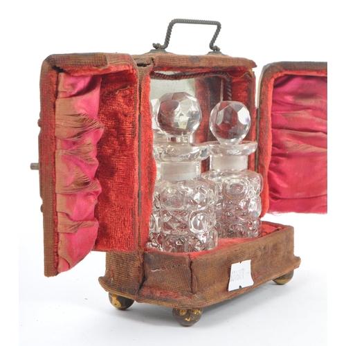 200 - A pair of Victorian / early 20th Century cased glass perfume / scent bottles. Having cut glass clear... 