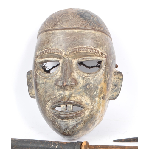 203 - A collection of assorted African Tribal / Ethnographic items comprising a wooden Pende style mask, x... 