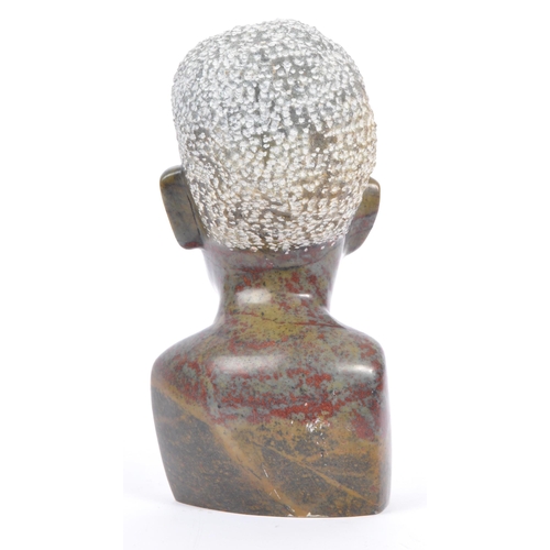 208 - A vintage late 20th century African stone soap carving of a male bust. Measures 15cm tall.