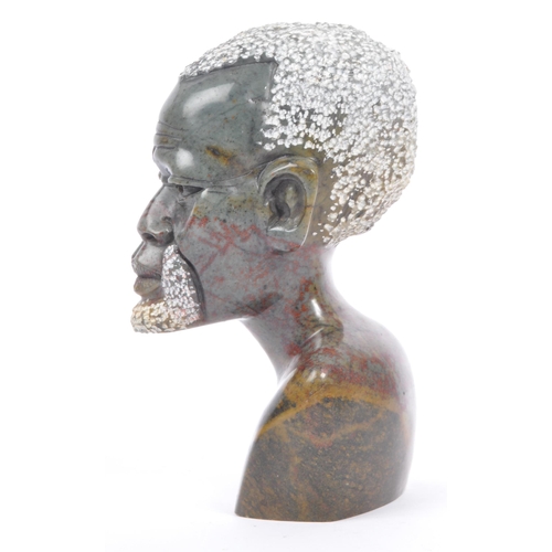 208 - A vintage late 20th century African stone soap carving of a male bust. Measures 15cm tall.