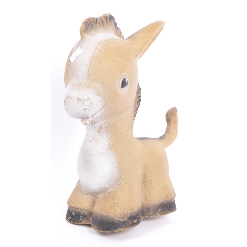 214 - Rosebud - A mid 20th century soft toy donkey, together with a mid century elephant. Made in England.... 