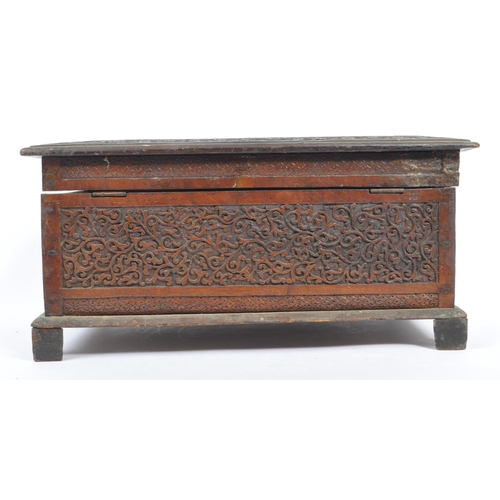 218 - A vintage 20th century Kashmiri carved camphor wood box. With dense foliate repeating carved patter.... 