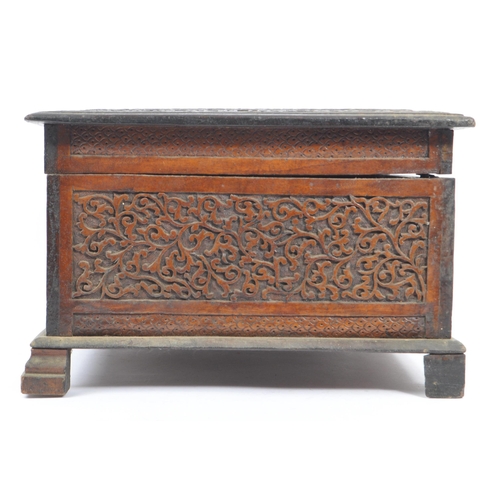 218 - A vintage 20th century Kashmiri carved camphor wood box. With dense foliate repeating carved patter.... 