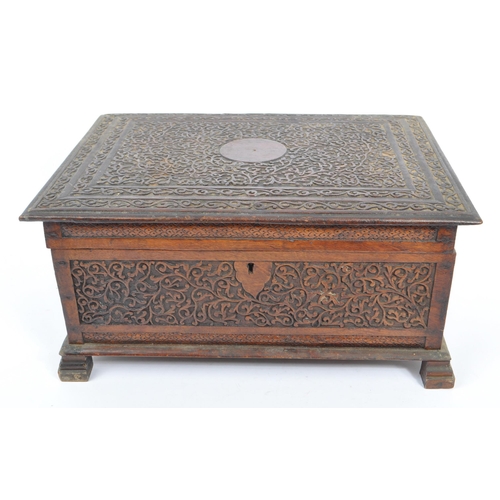 218 - A vintage 20th century Kashmiri carved camphor wood box. With dense foliate repeating carved patter.... 