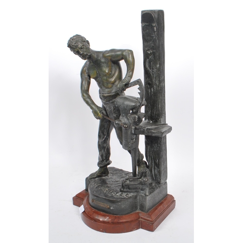 220 - A Circa 1900'S French 'Le Mecanicien' spelter figurine / sculpture by Victor Rousseau. A spelter fig... 