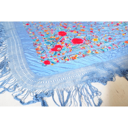 221 - A 20th century Qing Dynasty silk embroidered Chinese / Oriental textile embroidered shawl / throw. A... 