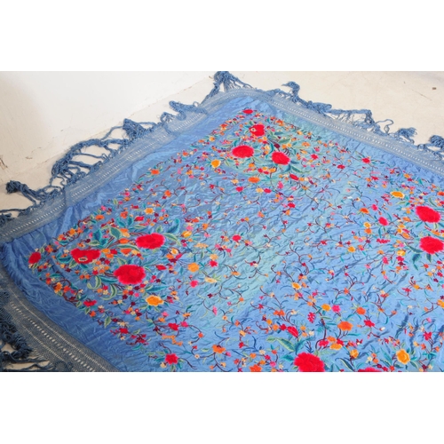 221 - A 20th century Qing Dynasty silk embroidered Chinese / Oriental textile embroidered shawl / throw. A... 