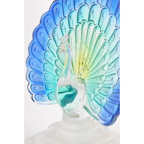 23 - A contemporary studio art glass ornament in the form of a peacock bird. Having green and blue feathe... 