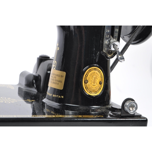 230 - A vintage 20th century Singer Featherweight convertible portable sewing machine model number 185k co... 